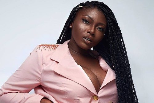 S3fa lifts her shirt to expose her pierced belly button as she readies to drop a new banger